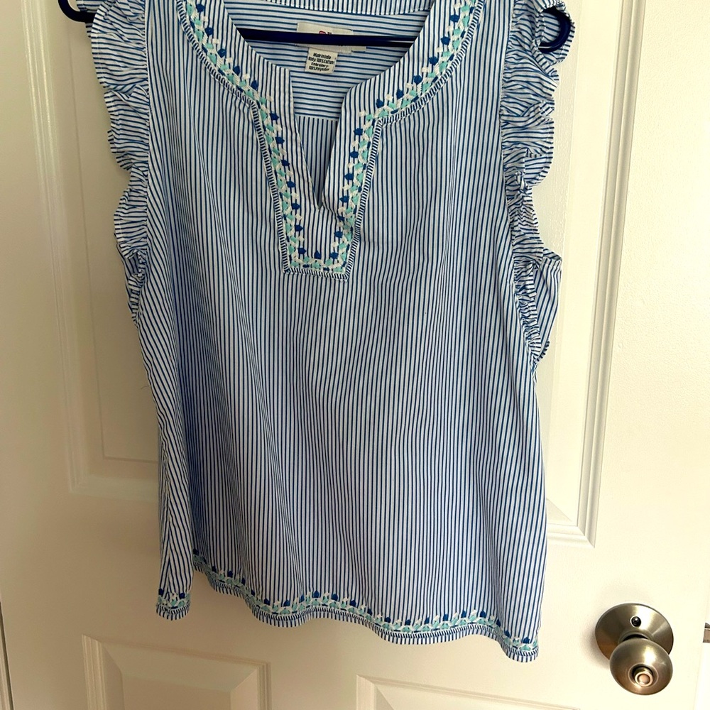 Embroidered flutter sleeve top.